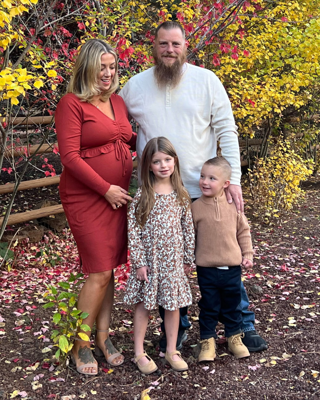 family photo of rwe family in the woods